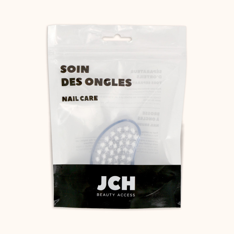 La brosse à ongles ovoïde translucide BA dans son packaging BA